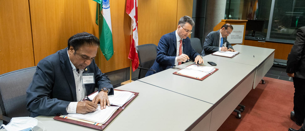  High Commissioner Ajay Bisaria signing the MoU for establishing Guru Nanak Dev Chair at Concordia University, Montreal